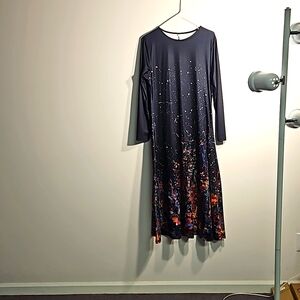 Long sleeved black with lots of colors on the bottom. Size lg